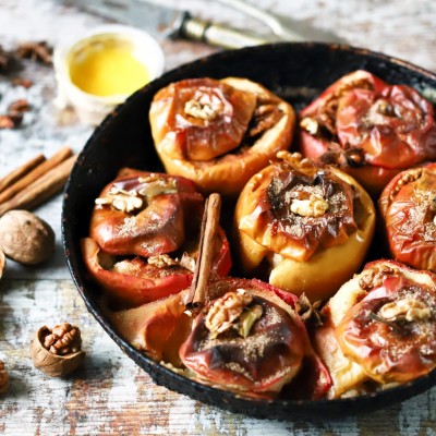 Baked apples with honey, cinnamon, walnuts and Walnut oil