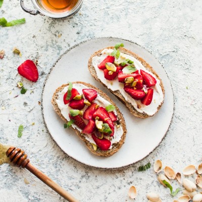 Strawberries, cheese spread, pistachios, honey & Pistachio oil on toasted bread